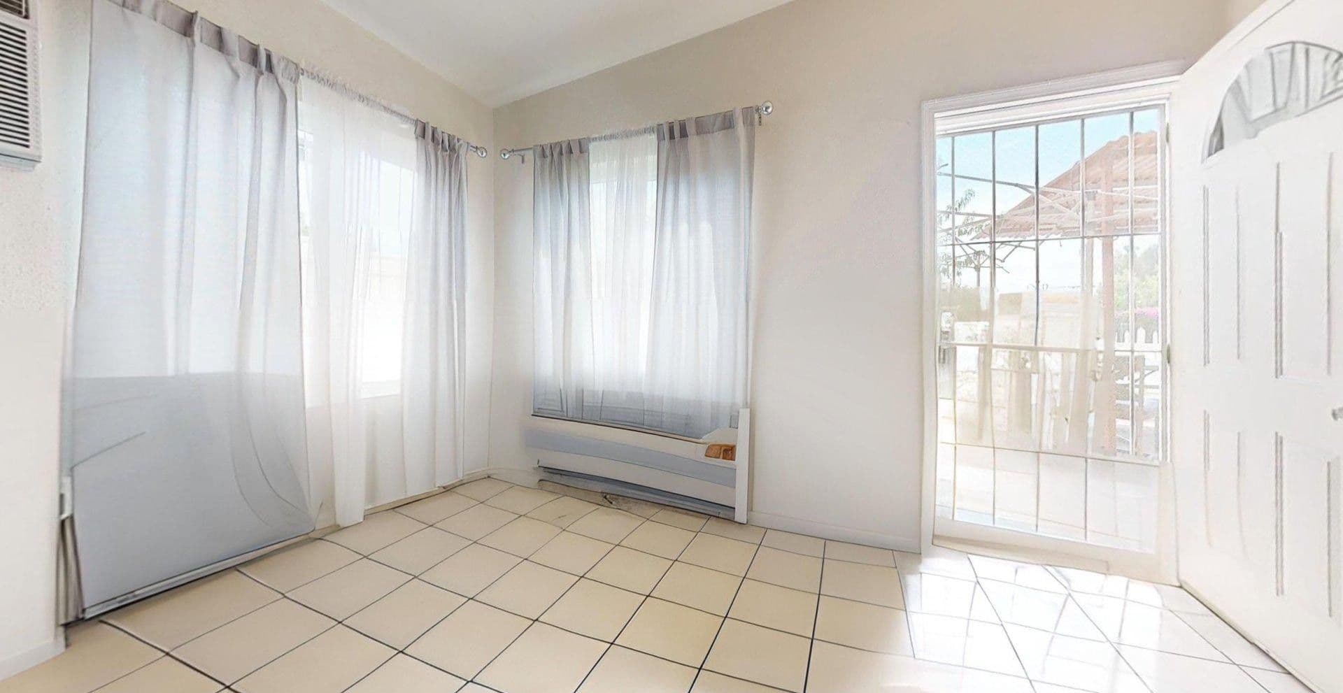 Supplied living-room photograph from the property listing